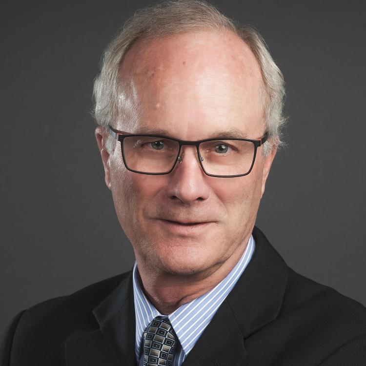 Dr.  J. Curtis Nickel